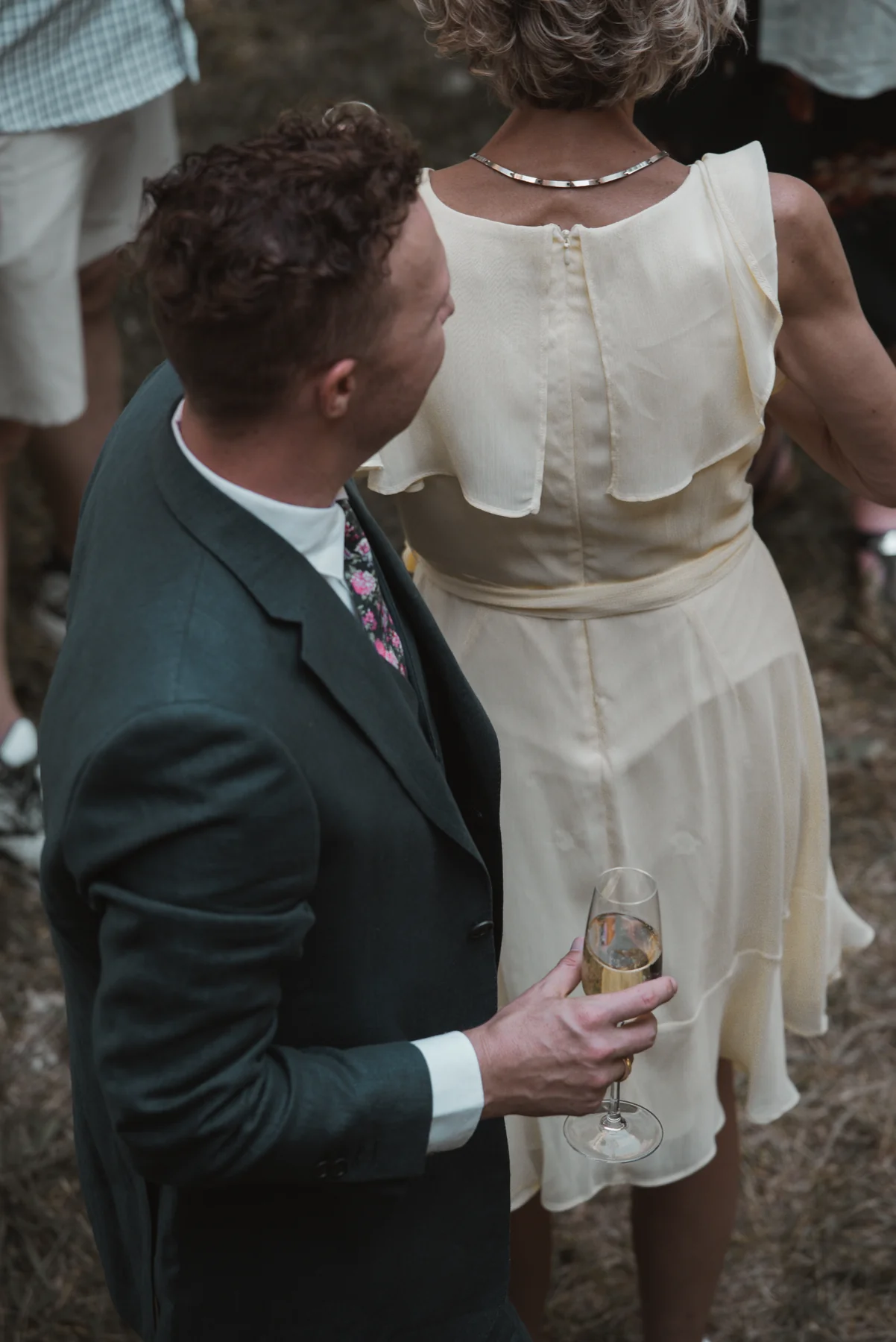 Wedding ceremony beneath a stone arch of the château — destination wedding in the South of France