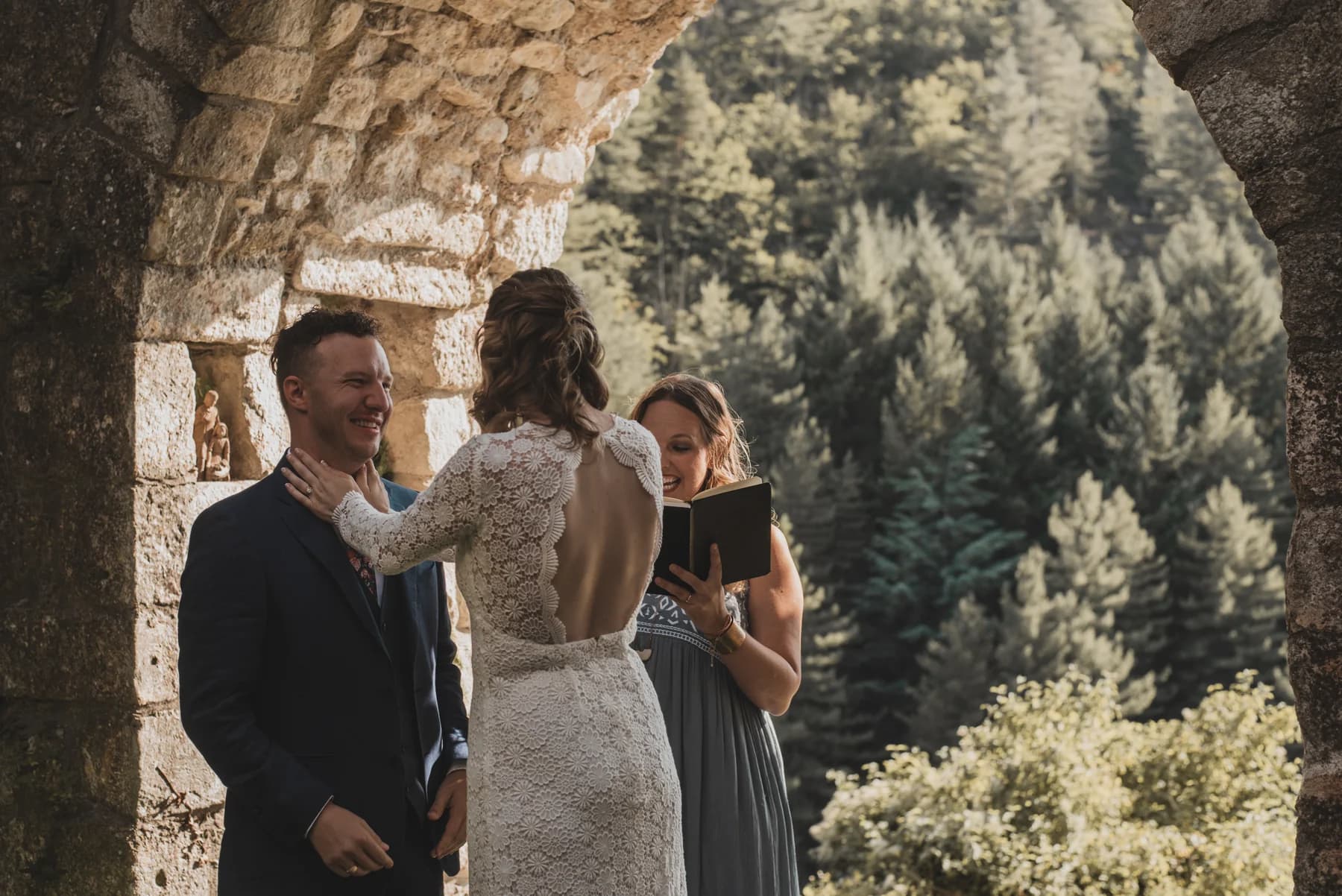 Exchange of vows at the stone altar — American wedding at Château de Boulogne, Ardèche