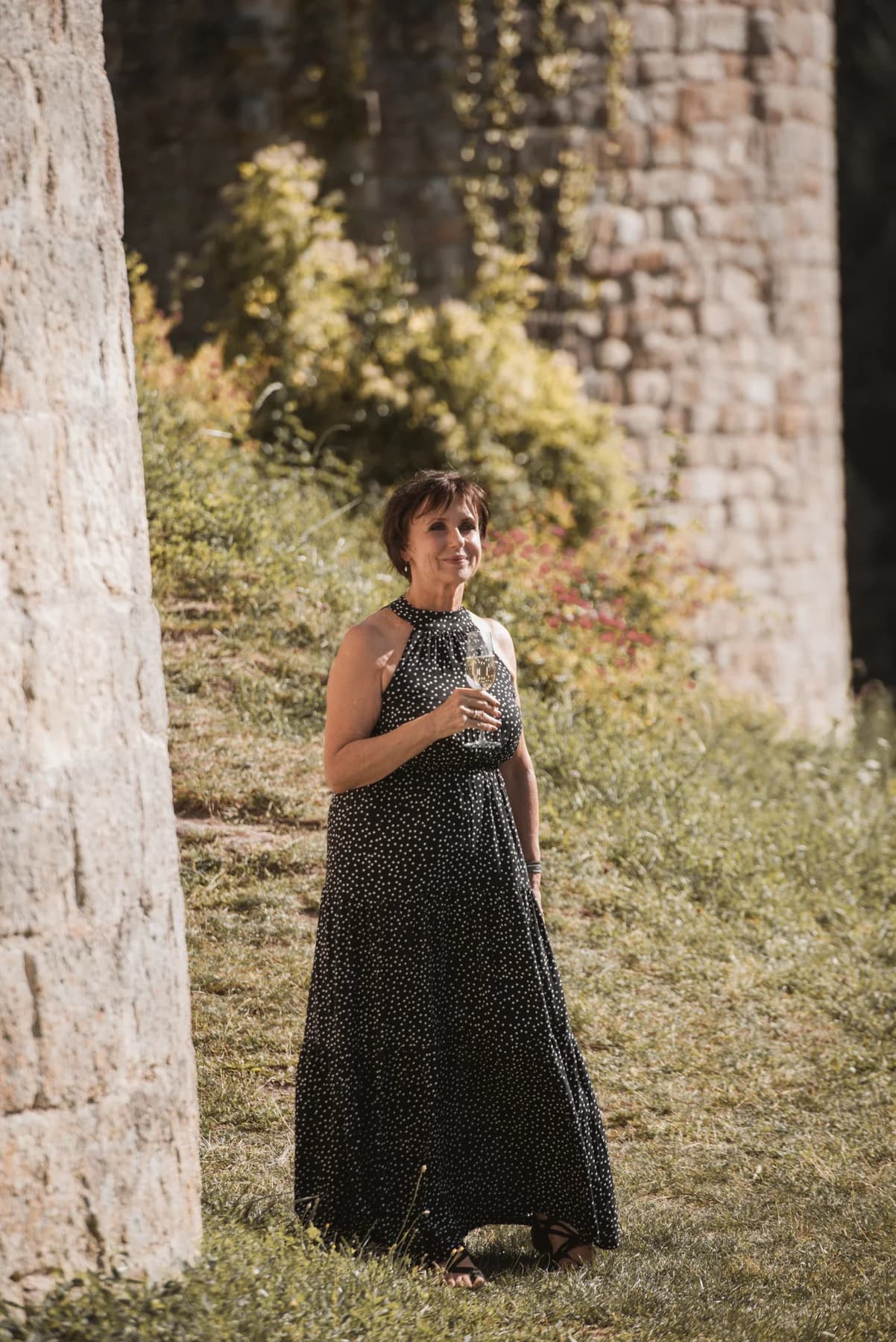 Bride with a wild bohemian bouquet — destination wedding at Château de Boulogne